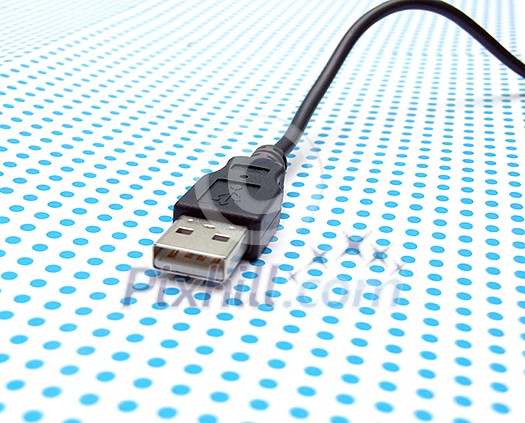 usb cable on dotted background usb cable on dotted background