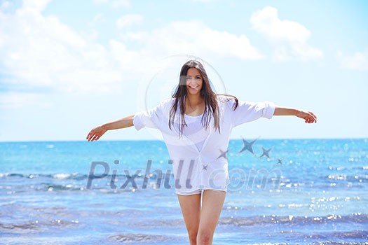 beautifel and happy woman girl on beach have fun and relax on summer vacation over the beautiful tropical sea beautifel and happy woman girl on beach have fun and relax on summer vacation over the beautiful tropical sea