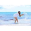 beautifel and happy woman girl on beach have fun and relax on summer vacation  over the beautiful tropical sea