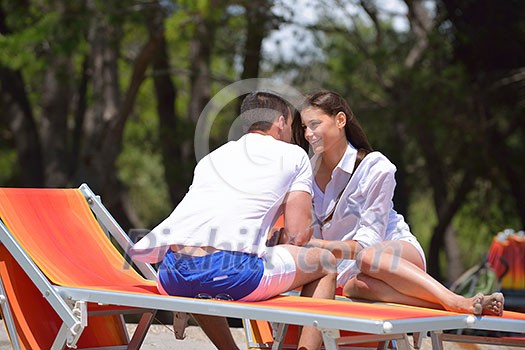 happy young couple have fun and relax on the beach happy young couple have fun and relax on the beach