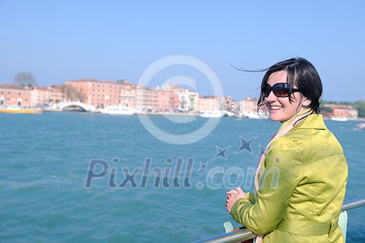 Beautiful tourist woman in Venice, exploring the old city Beautiful tourist woman in Venice, exploring the old city
