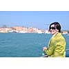 Beautiful tourist woman in Venice, exploring the old city
