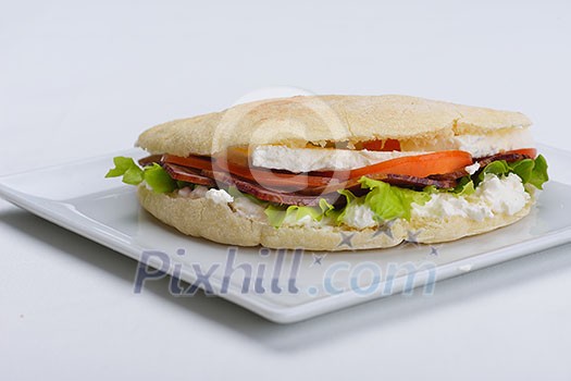 fresh sandwich close up with vegetables and meat fish isolated on white background fresh sandwich close up with vegetables and meat fish isolated on white background