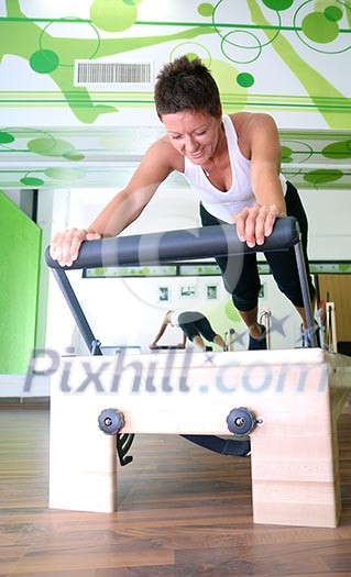 Working out, sport and healthy lifestyle concept with girls in gym. Working out, sport and healthy lifestyle concept with girls in gym.