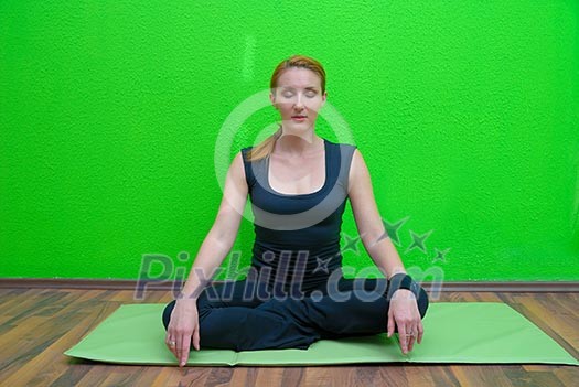 Girl in fitness studio doing yoga. Girl in fitness studio doing yoga.