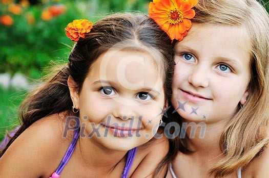 two happy young girls children have fun outdoor in nature two happy young girls children have fun outdoor in nature