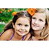 two happy young girls children  have fun outdoor in nature