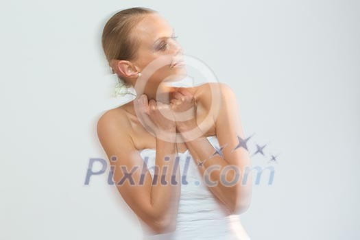 Gorgeous bride dancing, holding a rose (moiton blur technique used to convey the movement) Gorgeous bride dancing, holding a rose (moiton blur technique used to convey the movement)
