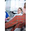 Group of college/university students during a brake between classes - chatting, comparing notes, having fun (shallow DOF; color toned image)
