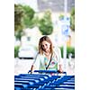 Beautiful young woman going shopping for groceries (color toned image)