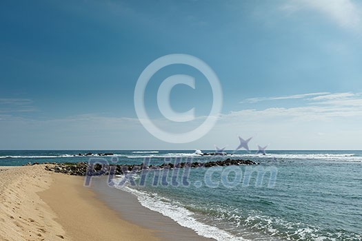 Wave breaker on beach. Mirissa, Sri Lanka Wave breaker on beach. Mirissa, Sri Lanka