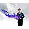 Handsome businessman holding frame with colorful splashes