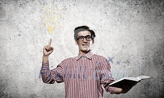 Young man in casual with book in hands Young man in casual with book in hands