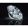 Diamond on black reflective background. 3d render