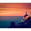 Vintage retro effect filtered hipster style image of Golden Rock - Kyaiktiyo Pagoda - famous Myanmar landmark, Buddhist pilgrimage site and tourist attraction, Myanmar