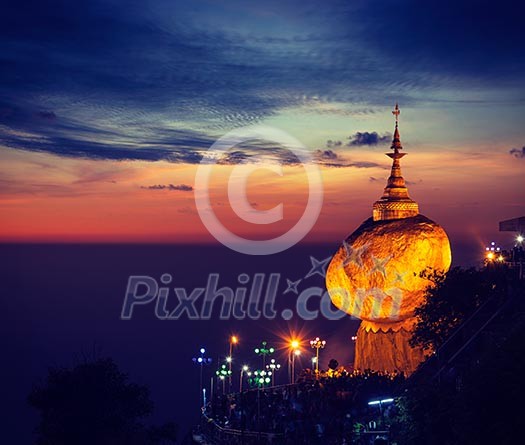 Vintage retro effect filtered hipster style image of Golden Rock - Kyaiktiyo Pagoda - famous Myanmar landmark, Buddhist pilgrimage site and tourist attraction, Myanmar Vintage retro effect filtered hipster style image of Golden Rock - Kyaiktiyo Pagoda - famous Myanmar landmark, Buddhist pilgrimage site and tourist attraction, Myanmar