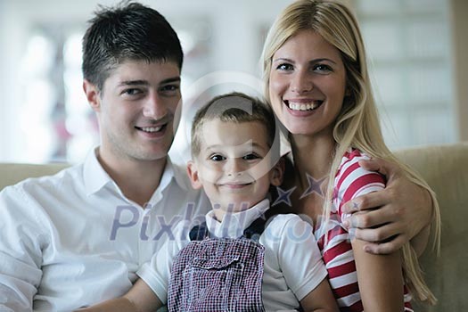 happy young family with kids in bright modern living room have fun and looking big flat lcd tv happy young family with kids in bright modern living room have fun and looking big flat lcd tv