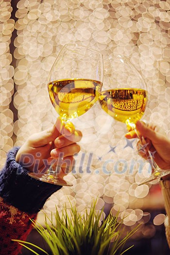 romantic evening date in hotel room, or supper in restaurant, happy couple with wine glass romantic evening date in hotel room, or supper in restaurant, happy couple with wine glass