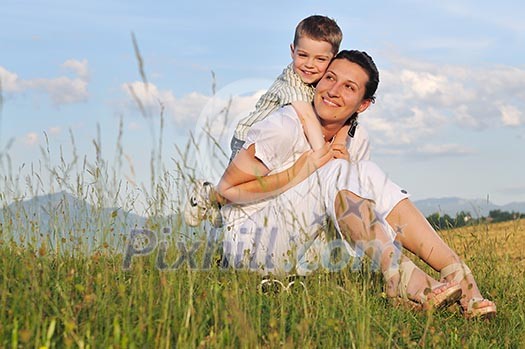 happy young woman mother play and outdoor with beautiful child happy young woman mother play and outdoor with beautiful child