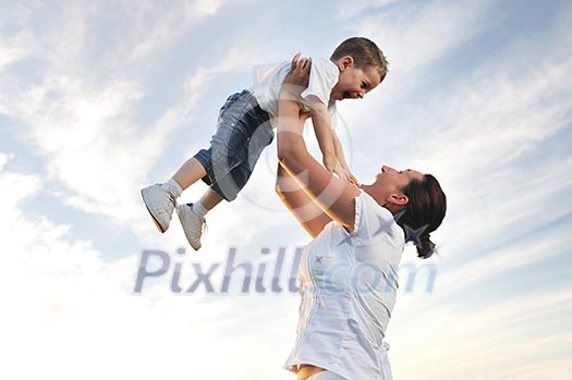 happy young woman mother play and outdoor with beautiful child happy young woman mother play and outdoor with beautiful child