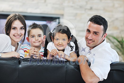 happy young family relax and have fun at modern home indooor happy young family relax and have fun at modern home indooor