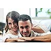 happy young couple relax at modern home livingroom indoor