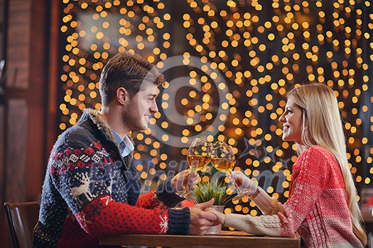romantic evening date in restaurant happy young couple with wine glass tea and cake romantic evening date in restaurant happy young couple with wine glass tea and cake