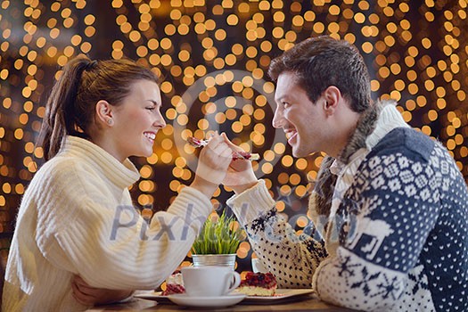romantic evening date in restaurant happy young couple with wine glass tea and cake romantic evening date in restaurant happy young couple with wine glass tea and cake