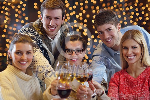 Group of happy young people drink wine at party disco restaurant Group of happy young people drink wine at party disco restaurant