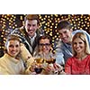 Group of happy young people drink wine at party disco restaurant