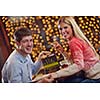 romantic evening date in restaurant  happy young couple with wine glass tea and cake
