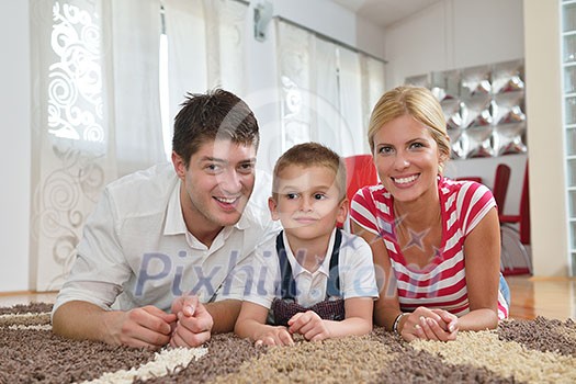 happy young family with kids in bright modern living room have fun and looking big flat lcd tv happy young family with kids in bright modern living room have fun and looking big flat lcd tv