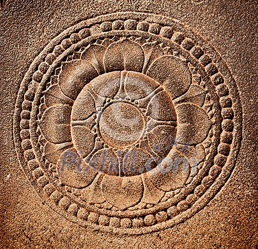 Stylized lotus carved on stone Stylized lotus carved on stone