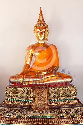 Sitting Buddha Gold Statue close up in Buddhist Temple. Wat Pho, Bangkok, Thailand Sitting Buddha Gold Statue close up in Buddhist Temple. Wat Pho, Bangkok, Thailand