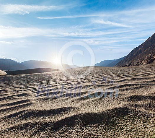 Sand dunes in Himalayas on sunrise. Hunder, Nubra valley, Ladakh, India Sand dunes in Himalayas on sunrise. Hunder, Nubra valley, Ladakh, India