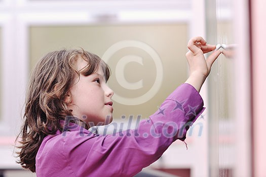 happy school girl on math classes finding solution and solving problems happy school girl on math classes finding solution and solving problems