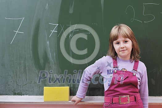 happy school girl on math classes finding solution and solving problems happy school girl on math classes finding solution and solving problems