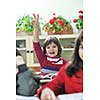 happy child  group in schoold have fun and learning leassos while looking for solutions and problems and rise a hand 