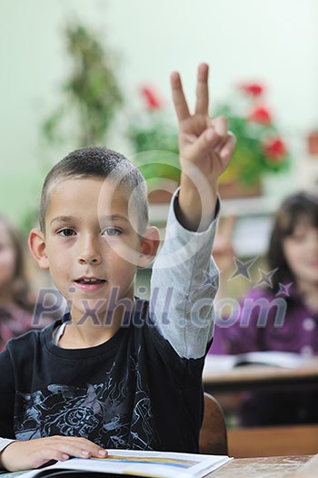 happy young boy at first grade math classes solving problems and finding solutions happy young boy at first grade math classes solving problems and finding solutions