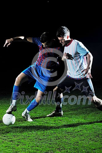 competition Action run and jump Duel of football players at soccer ball stadium at night competition Action run and jump Duel of football players at soccer ball stadium at night