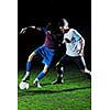 competition Action run and jump Duel of football players at soccer ball stadium at night