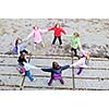 happy young child group outdoor standing together in circle formation and representing teamwork and friendship concept