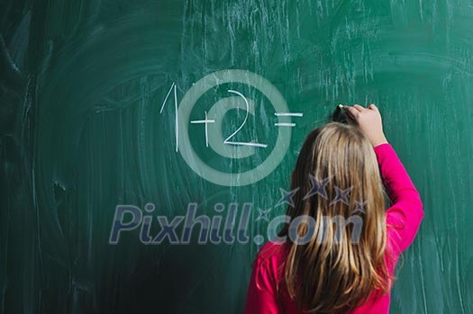 happy school girl on math classes finding solution and solving problems happy school girl on math classes finding solution and solving problems