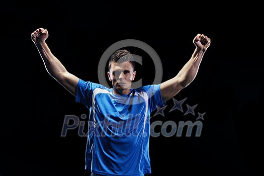 soccer player doing kick with ball on football stadium field isolated on black background soccer player doing kick with ball on football stadium field isolated on black background