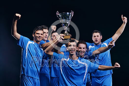 soccer players team group celebrating the victory and become champion of game while holding win coup soccer players team group celebrating the victory and become champion of game while holding win coup