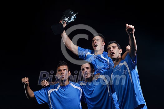 soccer players team group celebrating the victory and become champion of game while holding win coup soccer players team group celebrating the victory and become champion of game while holding win coup