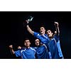 soccer players team group celebrating the victory and become champion of game while holding win coup