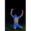 soccer player doing kick with ball on football stadium  field  isolated on black background