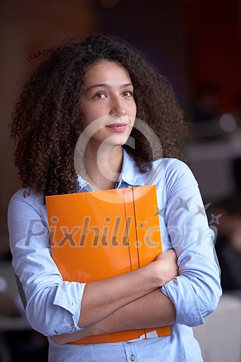 happy young curly business woman in the modern office happy young curly business woman in the modern office