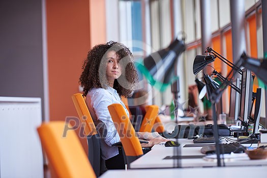 happy young curly business woman in the modern office happy young curly business woman in the modern office